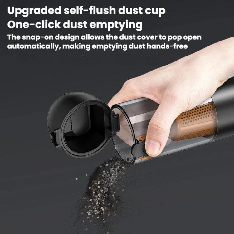 Hand holding black handheld cordless vacuum cleaner dust cup open