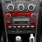 Red carbon-fiber style radio panel trim sticker on car audio center with knob cutouts