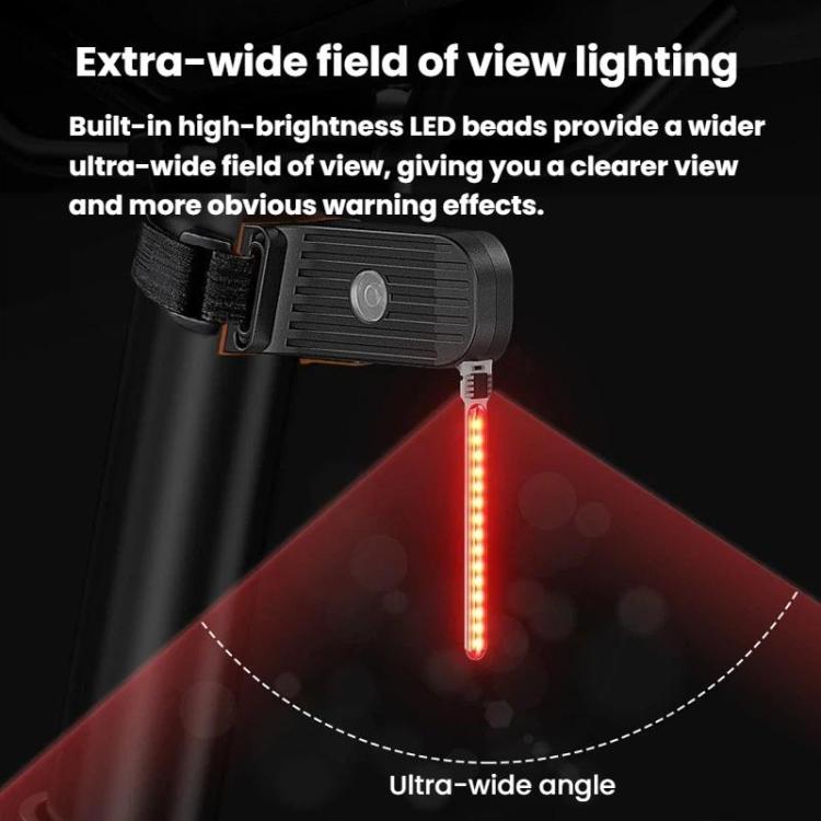 Bicycle tail light with red LED beam showing wide lighting coverage
