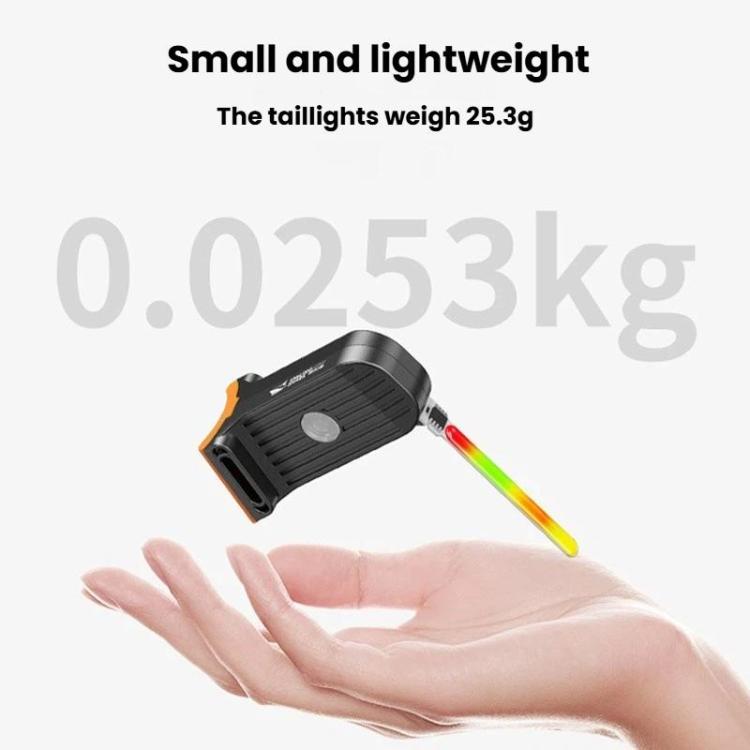 Compact bicycle tail light with red and green LED colors on a hand