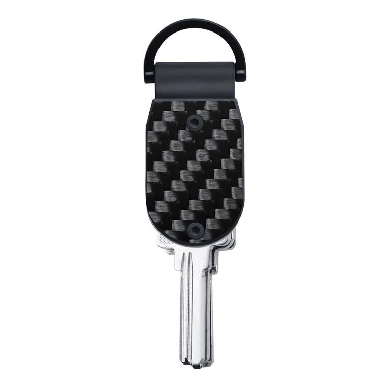 Mini aluminum key holder with black carbon-fiber style face and key blades