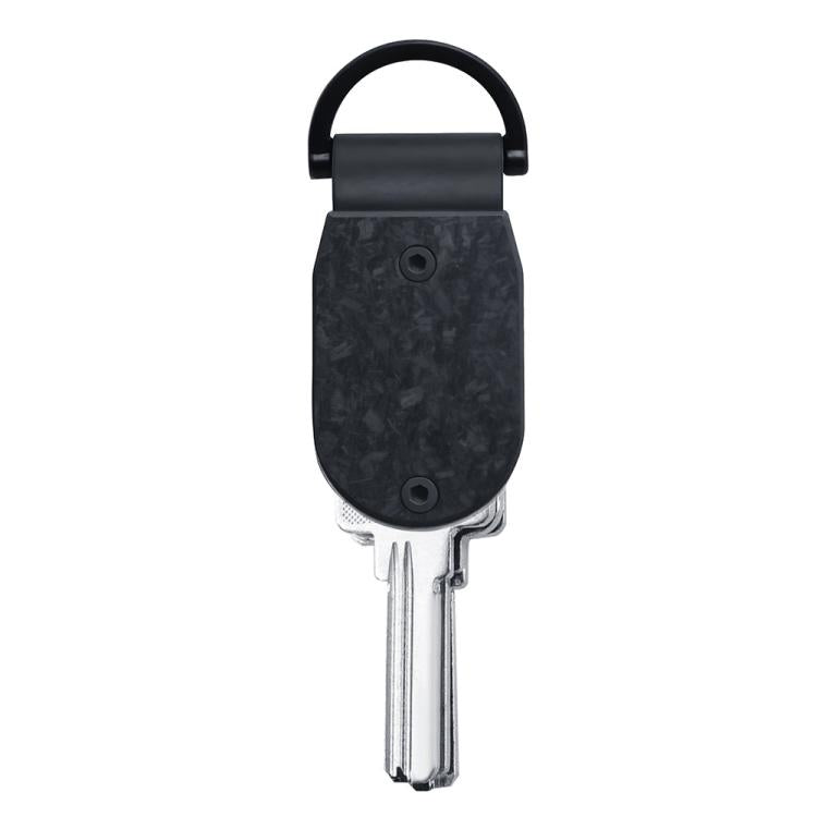 Mini aluminum key holder with dark textured carbon-fiber style body and keys