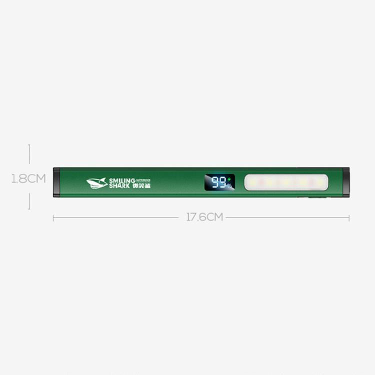 Green flashlight shown side profile with power display and white light strip