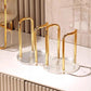 Gold acrylic cup holder for paper cups with four slots and clear ridged base