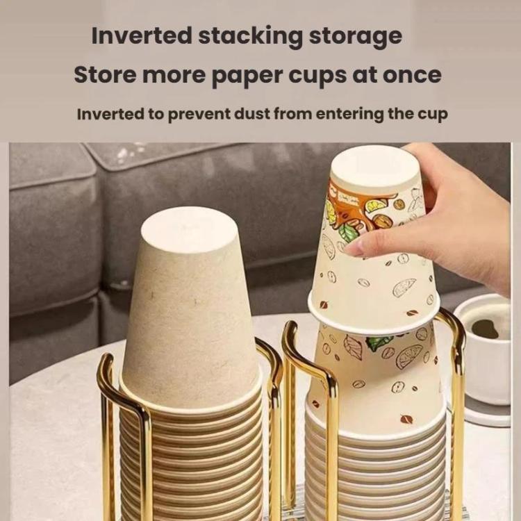 Gold acrylic cup holder with two stacks of paper cups on a clear ridged base