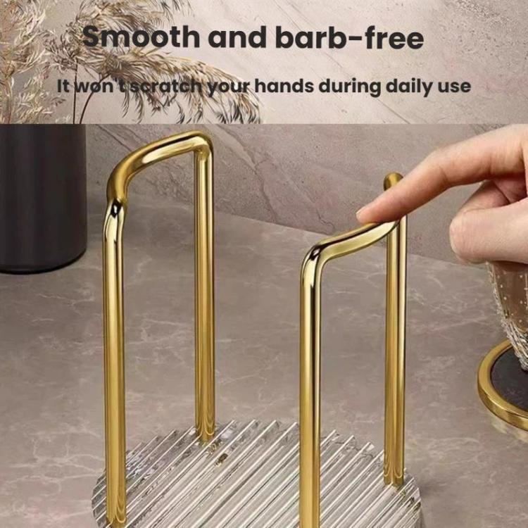 Gold acrylic cup holder with tall curved handles and clear ridged base