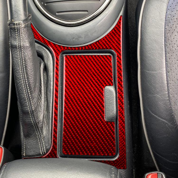 Red carbon-fiber cupholder sticker insert with side slot, installed in vehicle