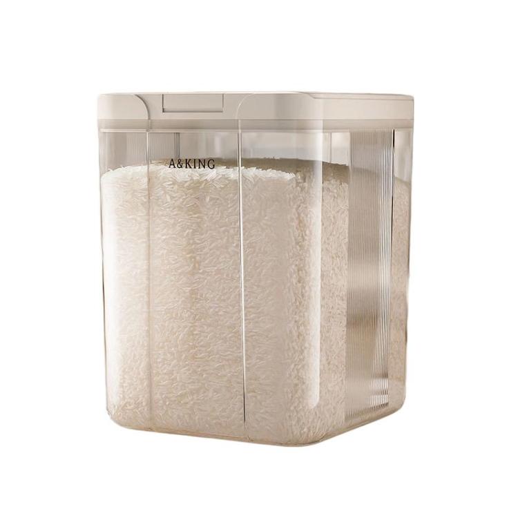 Transparent plastic cereal storage bucket with white press flip lid, filled with pale grains