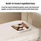 White cereal storage bucket with inset repellent box tray, holding dried spices inside