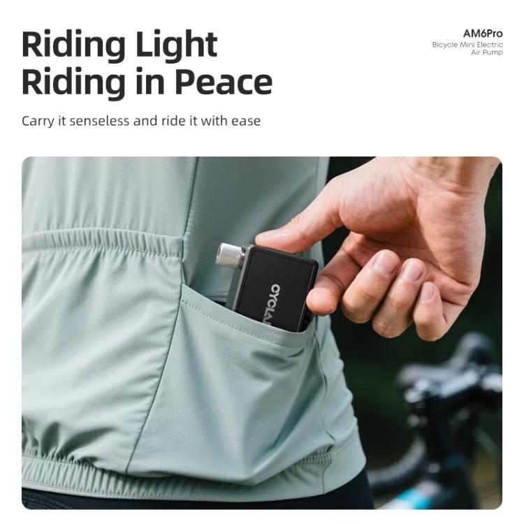 Compact portable electric bike air pump held in hand, fits in a pocket pouch