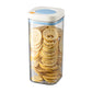 Vacuum food storage jar with blue lid, clear body filled with dried lemon slices