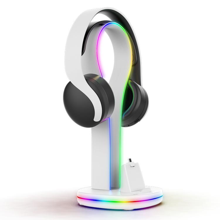 White headset stand dock holding black headphones with RGB light strip