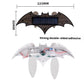 Solar-powered rear wing light with solar panel and adhesive tabs; bat-shaped design