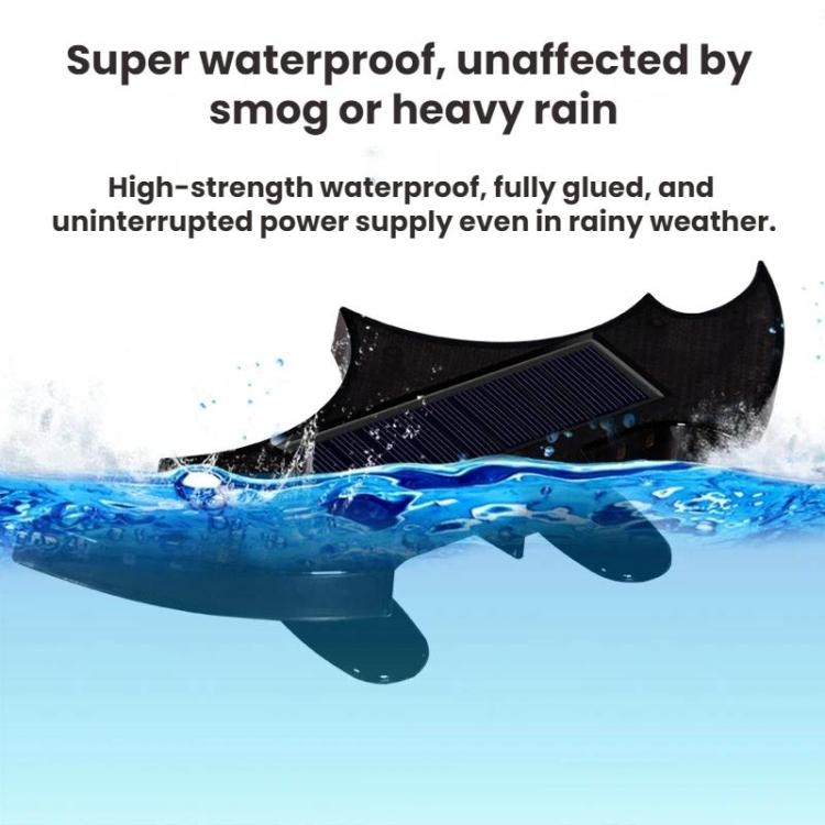 Solar-powered rear wing light with bat-shaped black housing and solar panel; water splash view