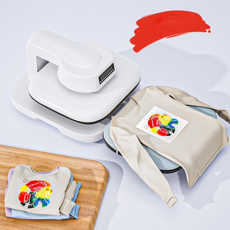 White heat press machine and folded T-shirts with colorful transfer print