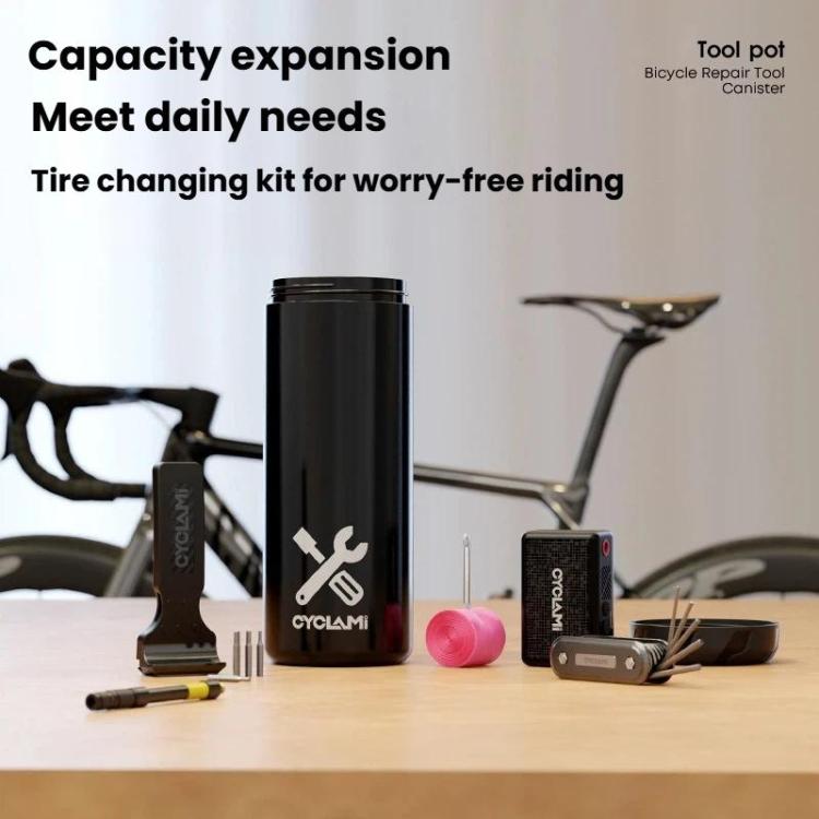 Black bottle-style tool canister with CYCLAMi logo on a tabletop