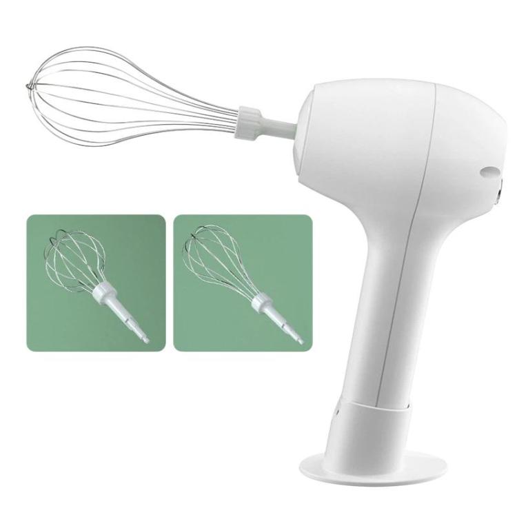 White handheld electric egg whisk shown with two whisk attachments and stand base