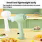 Light green handheld electric whisk with wire beaters and upright stand base