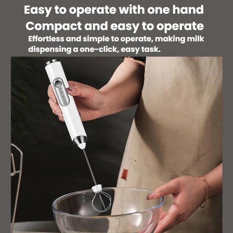 White wireless whisk frother being held over a mixing bowl