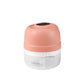 Rechargeable mini food chopper in pink with clear bowl and blade assembly