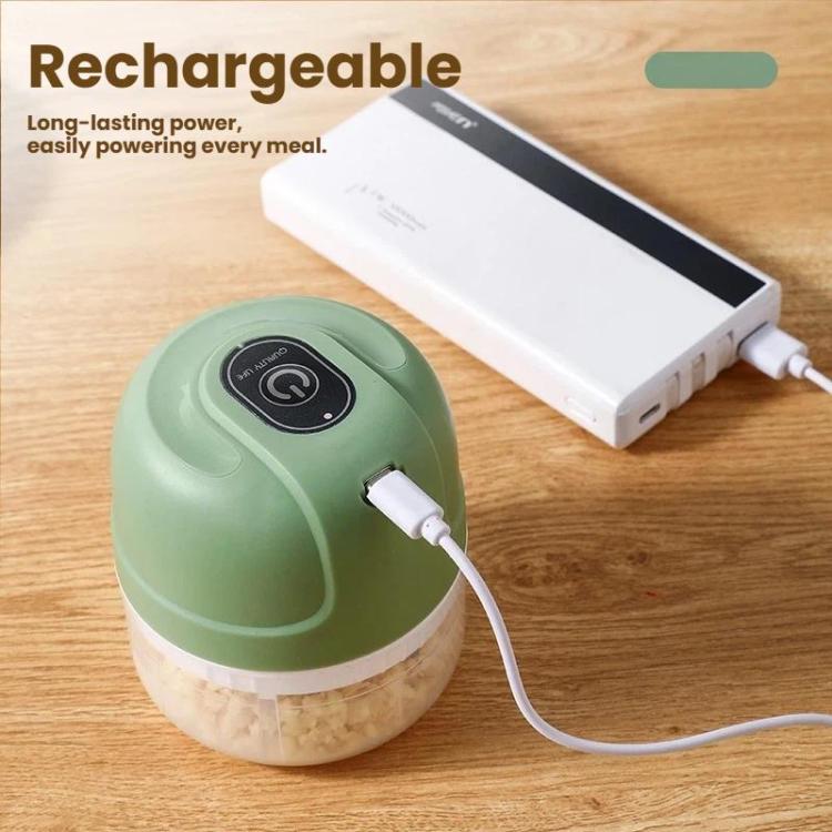 Green rechargeable mini food chopper charging with visible power cord