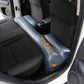 Inflatable rear seat gap filler air mat installed in car, dark blue cushion