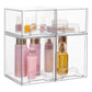 Transparent stackable cosmetic organizer with multiple open bins for bottles, jars, and makeup tools