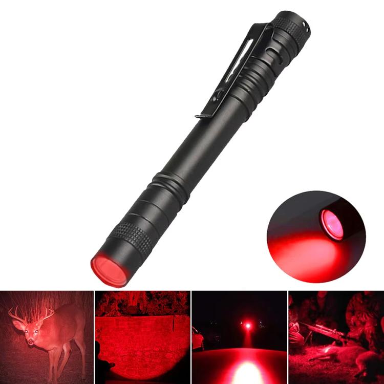 Black mini flashlight with red light beam close-up, compact handheld LED body