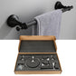 Black wall-mounted towel bar and robe hook set, with hardware parts in open box