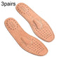 Tan leather insoles with ventilation dots, arch support, and thick comfort padding
