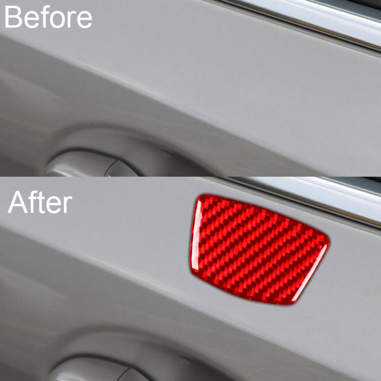 Red carbon-fiber door pillar sticker on car door panel near interior handle