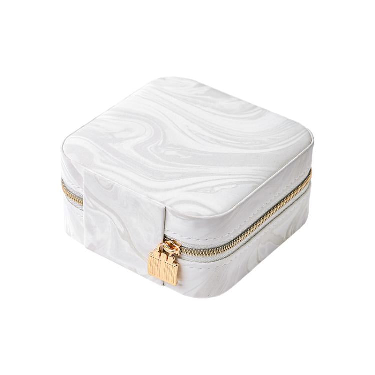 White travel jewelry organizer pouch with water-ripple velvet texture and gold zipper.