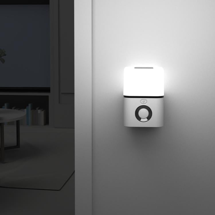 Wall-mounted sensor night light with bright white glow and round control button