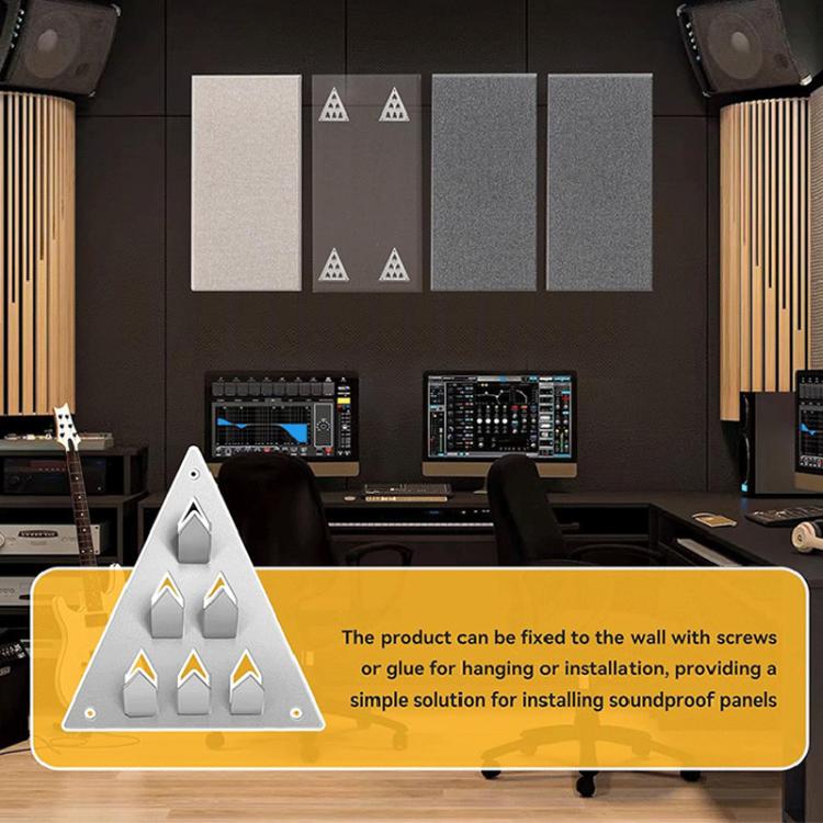 Wall-mounted triangle acoustic panel clamp base holding sound panels on metal spikes