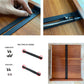 Black reinforcement rail being installed on a wooden drawer with mounting screws