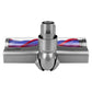 Anti-tangle roller brush head with central nozzle and blue roller with red bristle detail