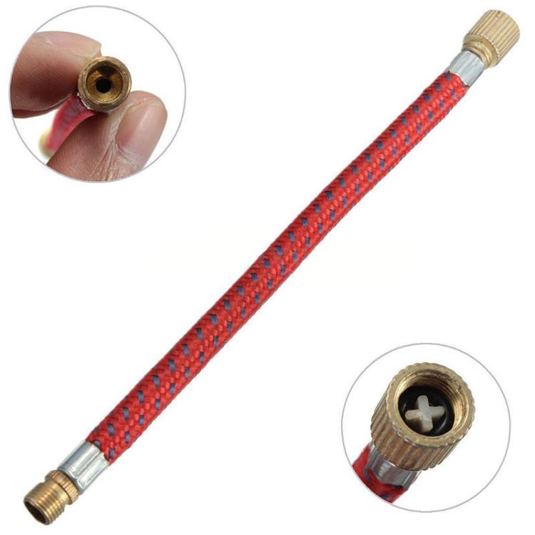 Red textured rubber bicycle pump extension hose with brass ends and threaded fittings