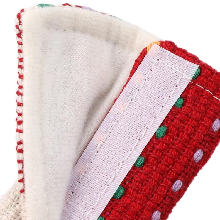 Car seat belt shoulder cover close-up of red woven fabric with white stitched edge