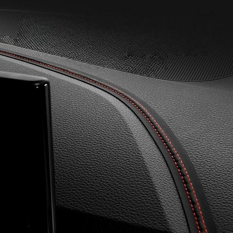Black leather-style car interior trim strip with red stitched edge detail