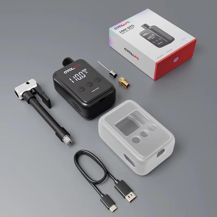 Black portable air pump with smart display, nozzle adapters and USB cable