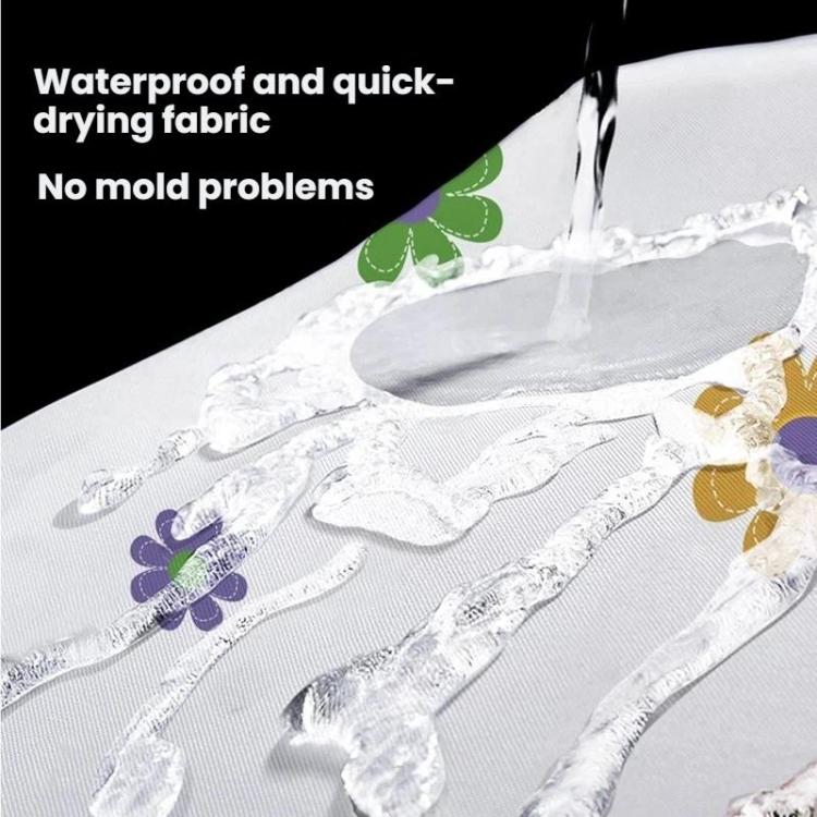 White shower curtain fabric detail with floral print and water-beading texture