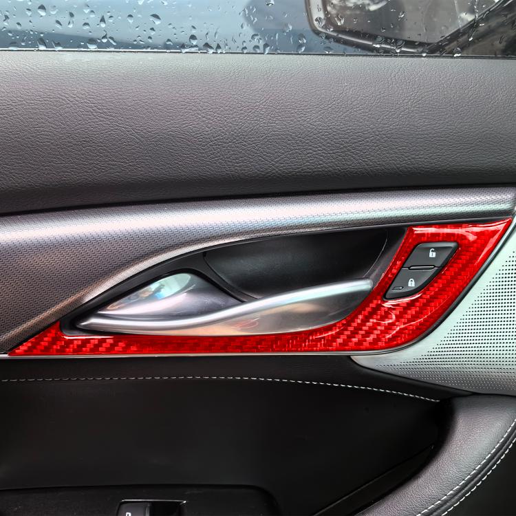 Red carbon-look interior door handle trim stickers on door pull area, arched set