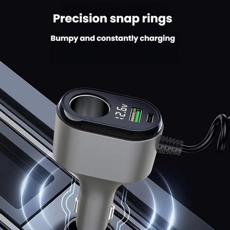Car charger adapter close-up with voltage screen and USB ports, silver, black trim