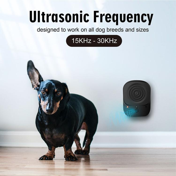Wall-mounted style black ultrasonic bark control device with speaker grille and indicator