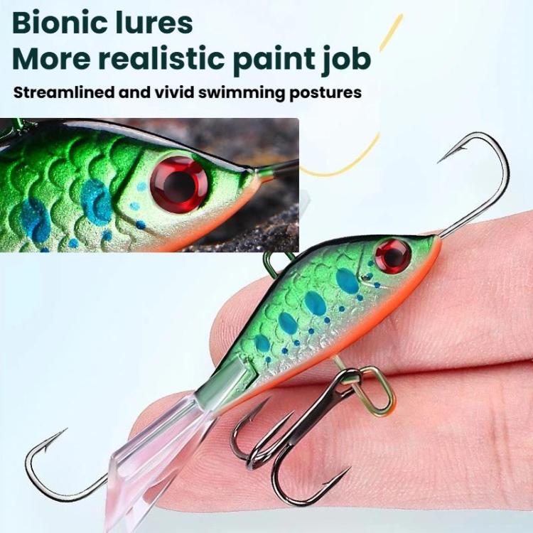 Balanced ice fishing lure close-up, green-blue speckled body with red eye and treble hooks