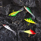 Assorted metal minnow ice fishing lures in green, yellow, red with treble hooks