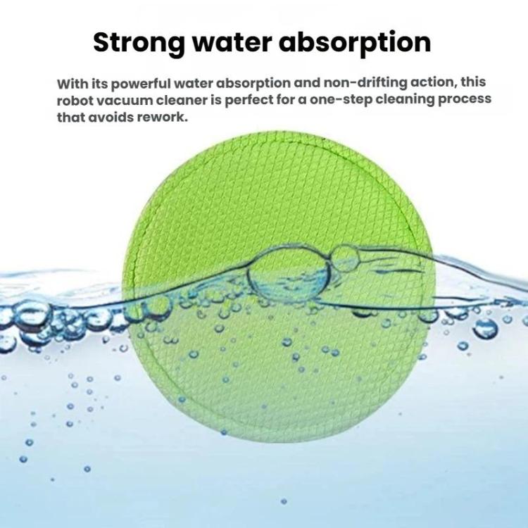 Round green waffle-weave robot mop pad with water droplets across the surface.