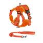 Orange dog vest harness with padded chest panel and matching leash strap set