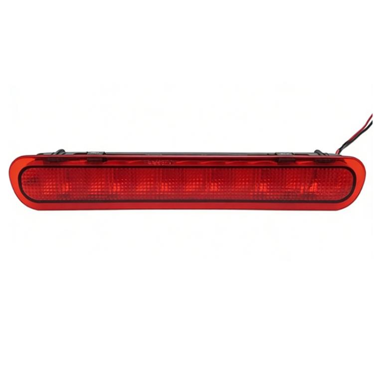 High-mounted brake light with red lens, black housing, and attached wiring