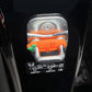 Car door lock cover clip front view, orange silicone pad with green bumper tabs